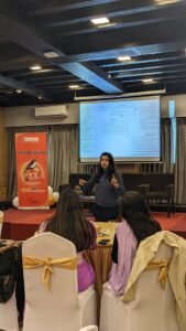 A Corporate Trainer taking her training session.