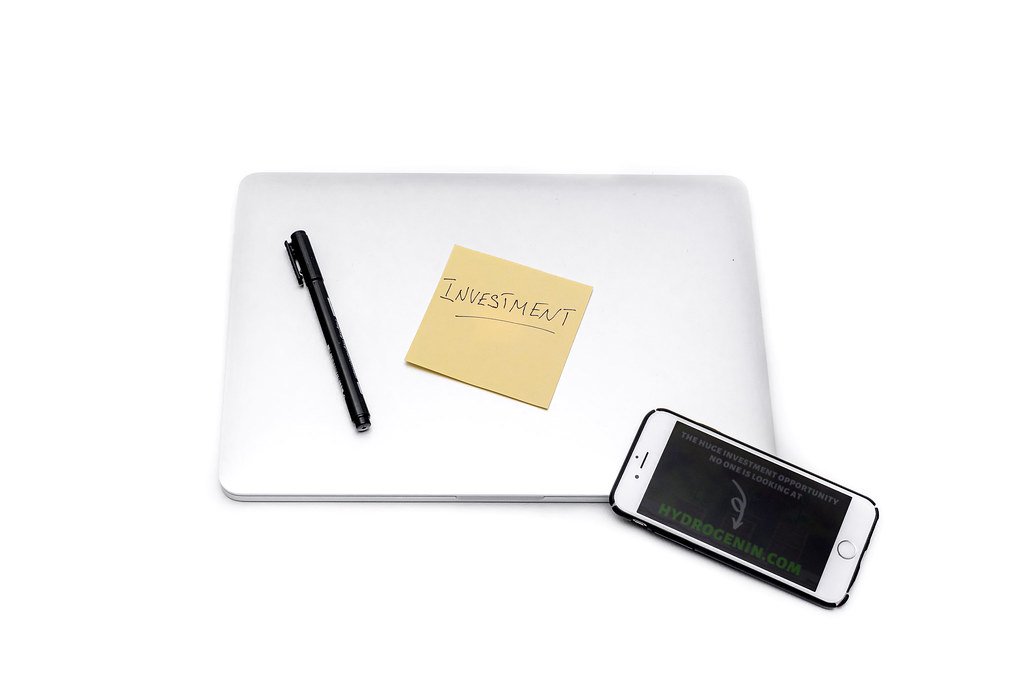 AI Readiness Consulting %corporate custom e-learning training agency% Reviewing analytics dashboard on laptop