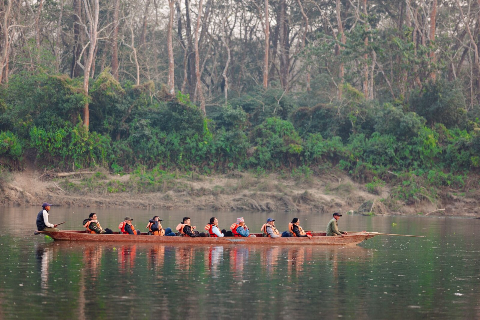 Group boating on a calm lake, Nepal