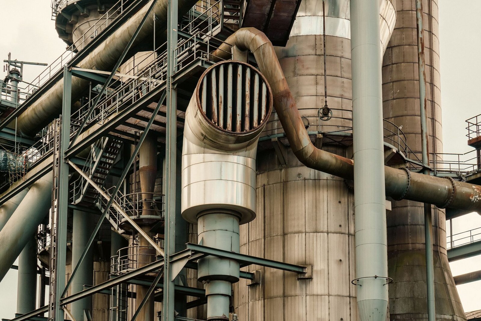 ESG Consulting Nepal %corporate custom e-learning training agency% Industrial factory pipes and metal structures in a manufacturing facility
