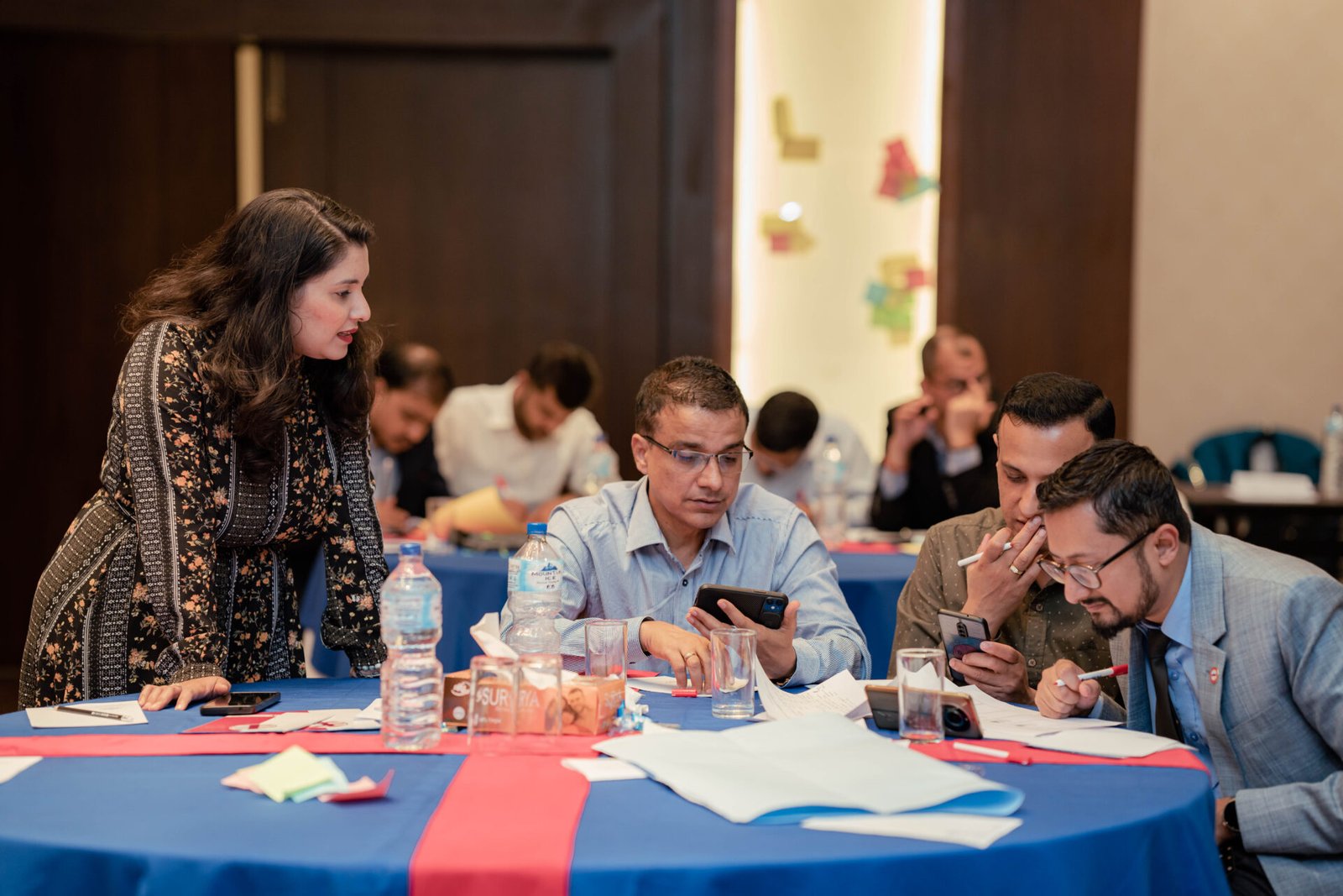 Home %corporate custom e-learning training agency% Learn Infinity team reviewing a strategy session together